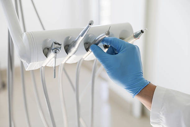 Professional Tooth Extraction technician working in Purcell, OK